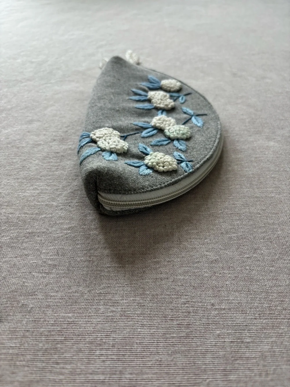 Grey embroidered floral half moon whimsical coquette clutch bag.